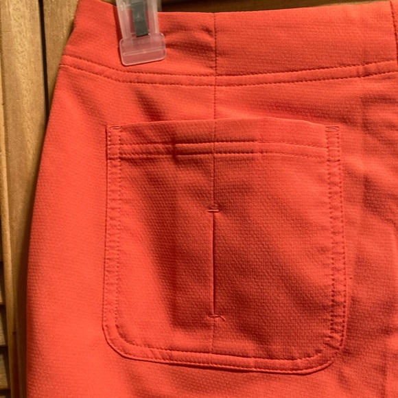 Annika Cutter and Buck Orange Golf Bermuda Shorts - Picture 10 of 12